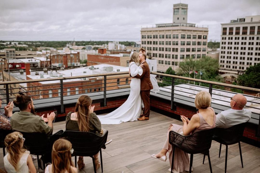 Clint & Mandy — A rooftop celebration photo 33