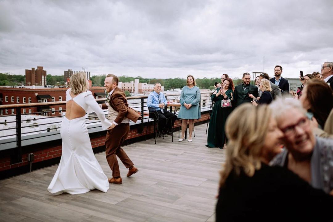 Clint & Mandy — A rooftop celebration photo 42
