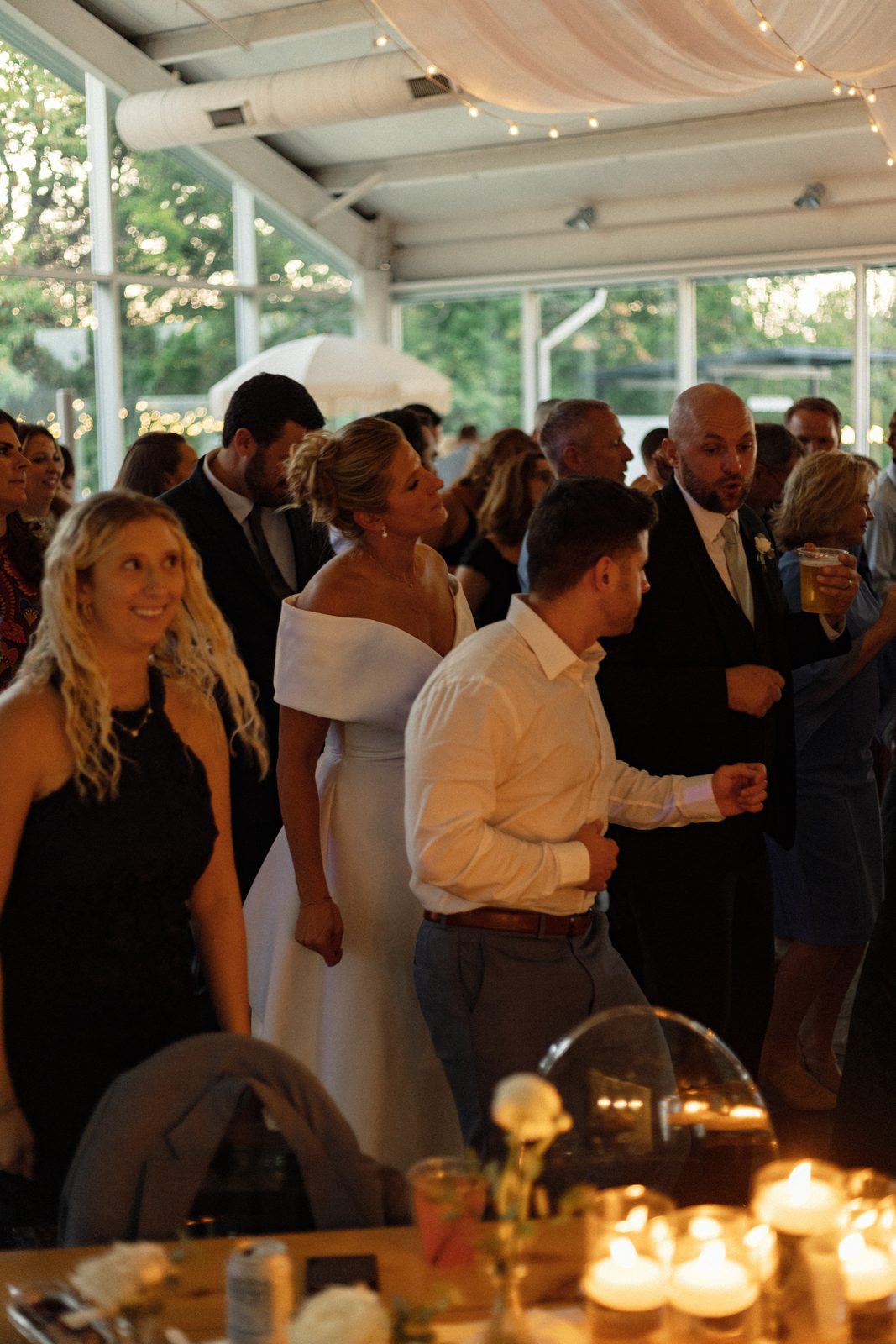 Katie and Mark on the dance floor with their guests at Greenhouse Two Rivers